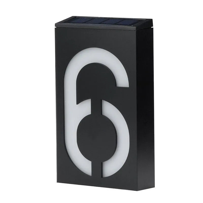Solar powered house number light with 6 LEDs and IP65 waterproof rating mounted on an exterior wall.