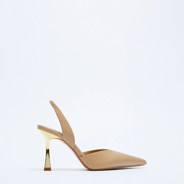 Women's pointed patent leather high heels in nude apricot colour with shallow cut design