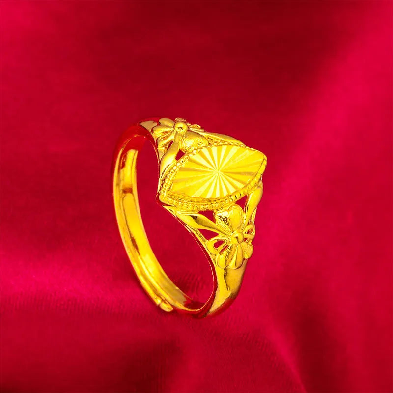 Gold electroplated open geometric flower ring with textured brass construction