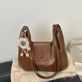 Women's black PU leather single shoulder bag with horizontal square shape and dedicated phone compartment