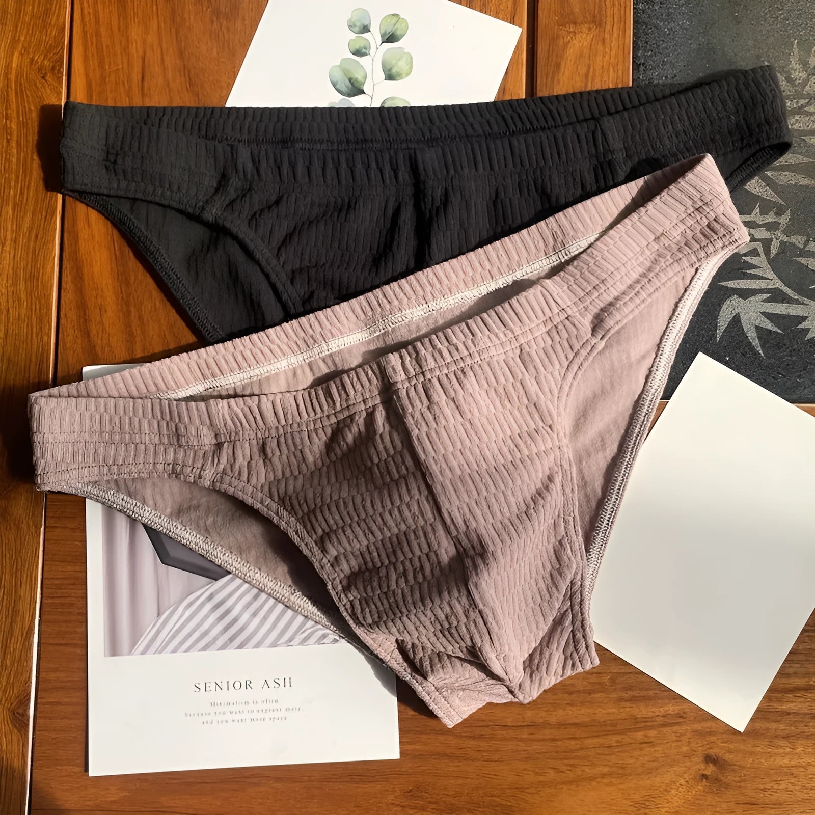 Men's solid colour cotton triangle underwear briefs in mid-waist design on a white background
