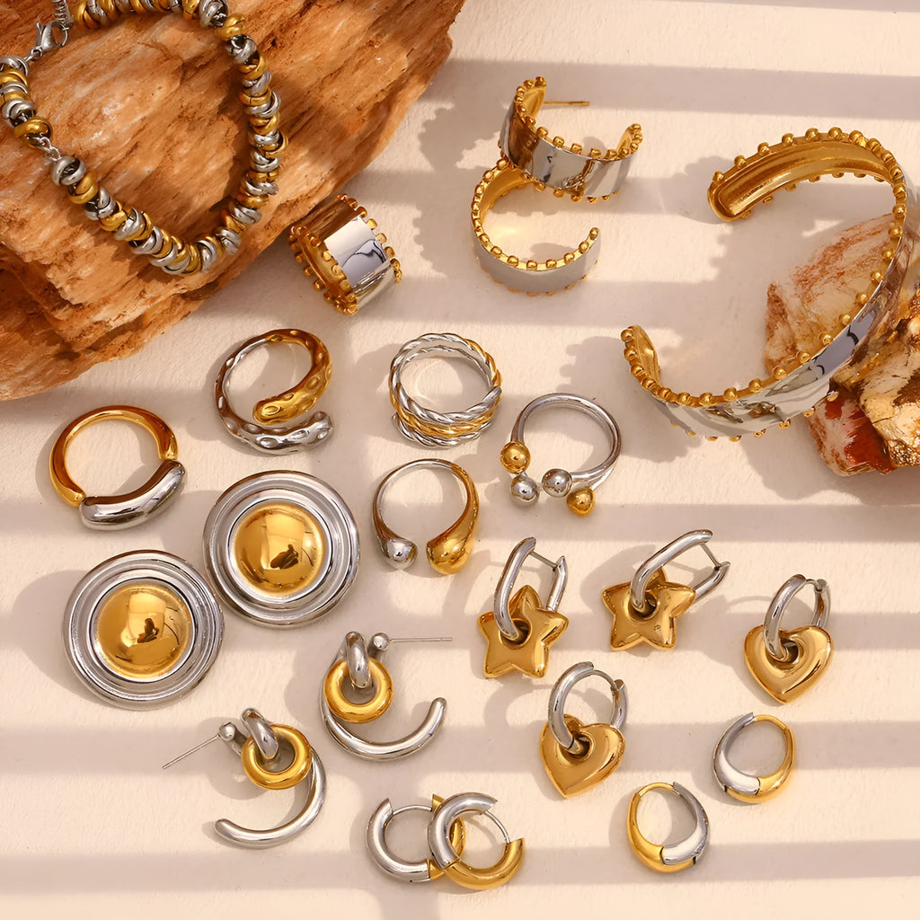 Gold colour jewellery set with geometry round ring design including earrings, necklace, and bracelet