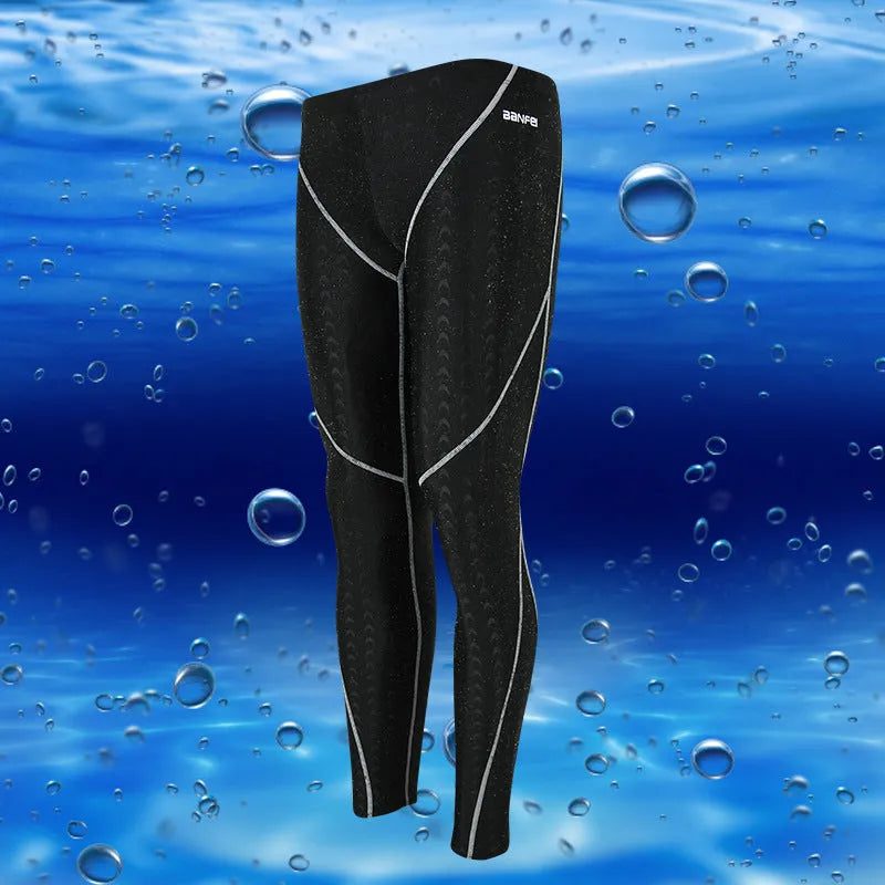 Men's black and grey line nylon cropped swimming trunks laid flat, briefs style.
