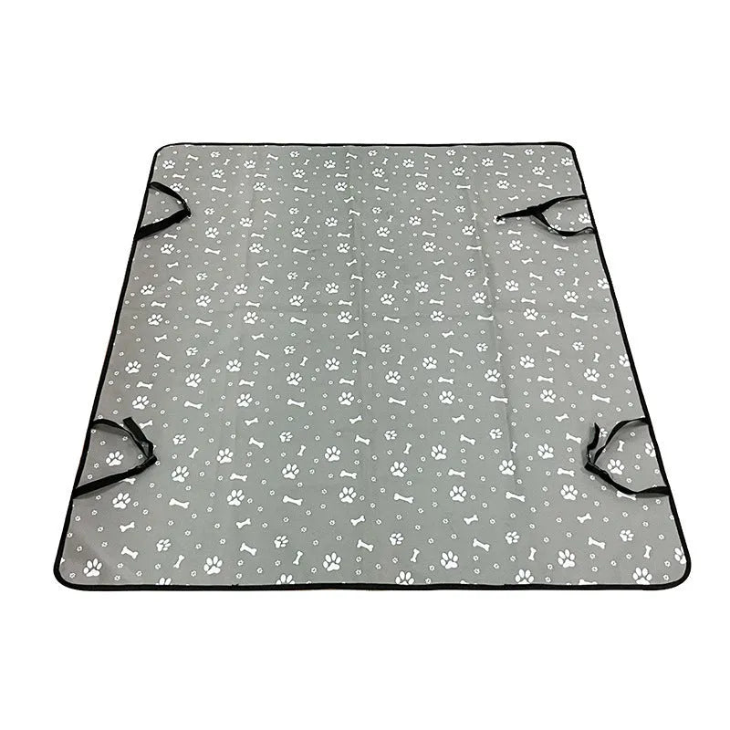 Dog car seat protector mat on rear bench seats in grey dog footprints pattern