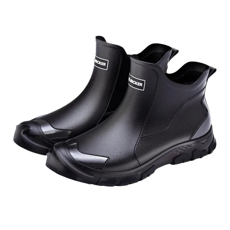 Short tube PVC wading shoe covers with round toe and non-slip plastic sole in solid colour.