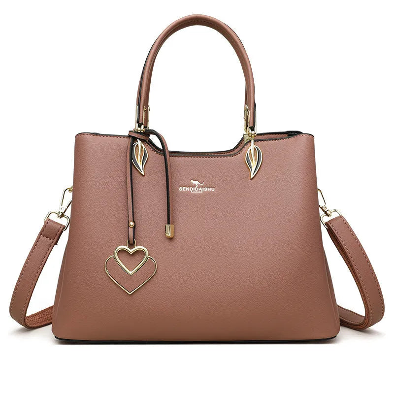 Women's PU leather messenger bag in multiple colours with cross-body strap and stitching detail