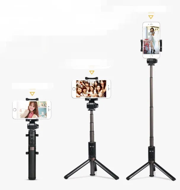 Aluminium alloy Bluetooth tripod selfie stick with remote control extended, holding a mobile phone.