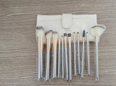 Persian makeup brush set with rice white bristles and champagne coloured handles showing multiple brush types