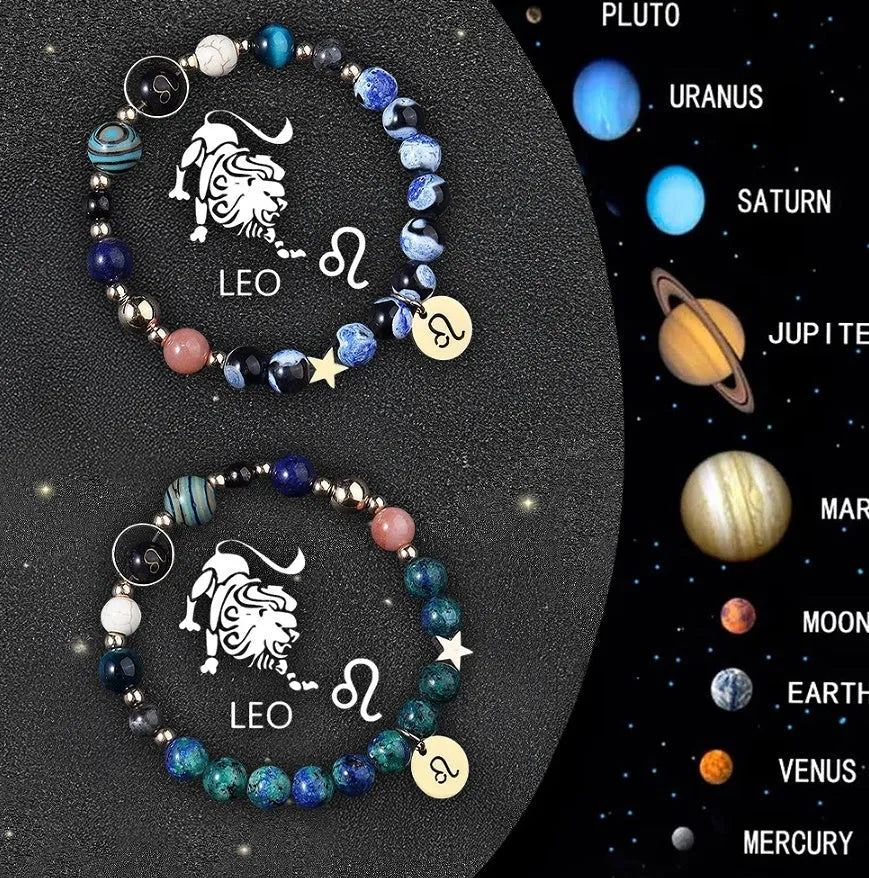 Two natural stone beaded bracelets with zodiac sign charms on a dark background.