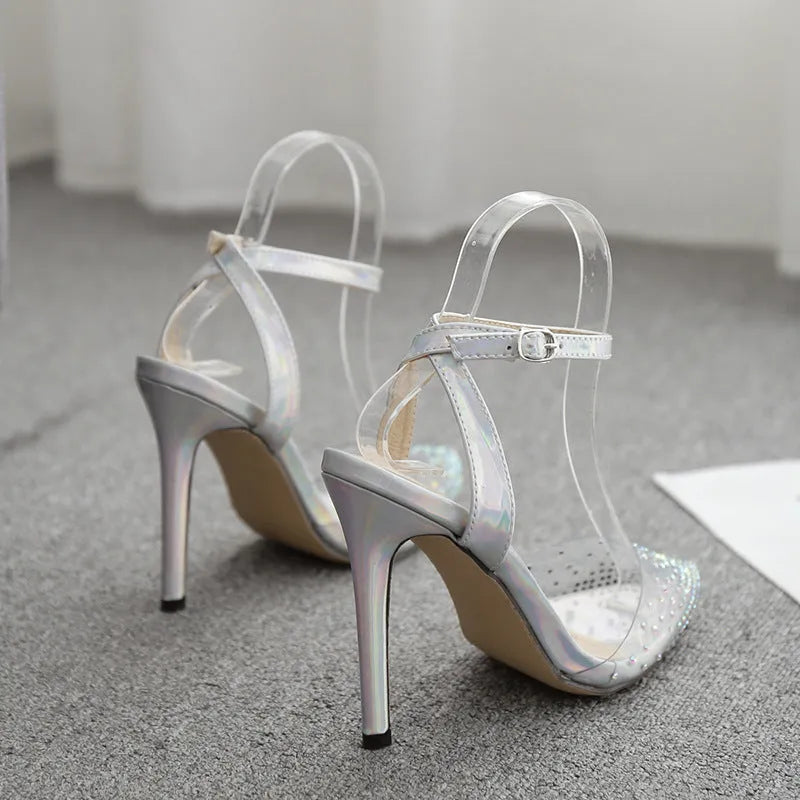 Women's pointed diamond sandals with stiletto heels and strappy PVC construction