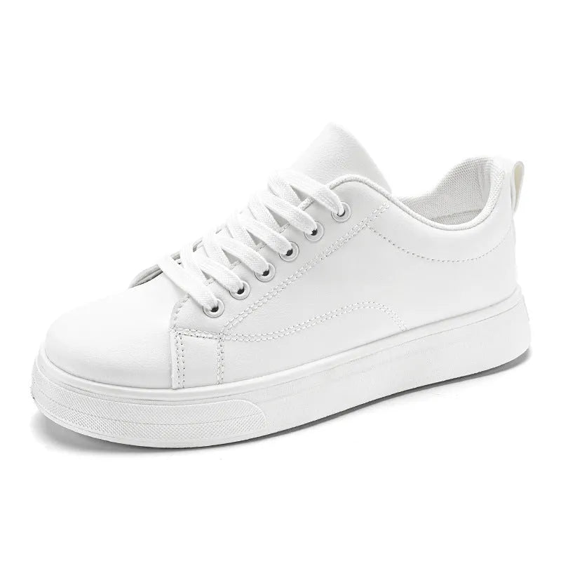 Men's low-top Korean-style sneakers in white and black colour options with round toe and flat rubber sole