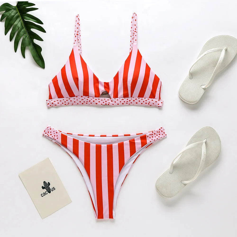 Women's red and white striped polyester bikini set and black and white polka dot bikini set.