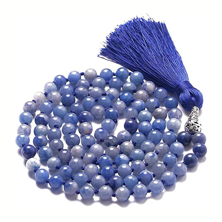 Long multicoloured agate and gemstone tassel necklace with geometric beads.