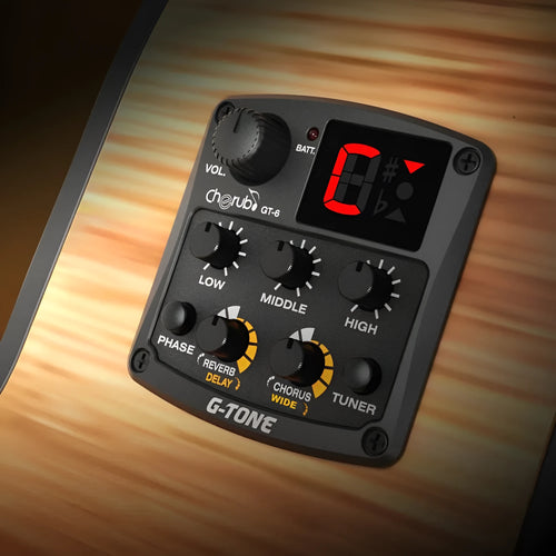 Black Cherub GT-6 acoustic guitar soundhole pickup unit with EQ and effects knobs.