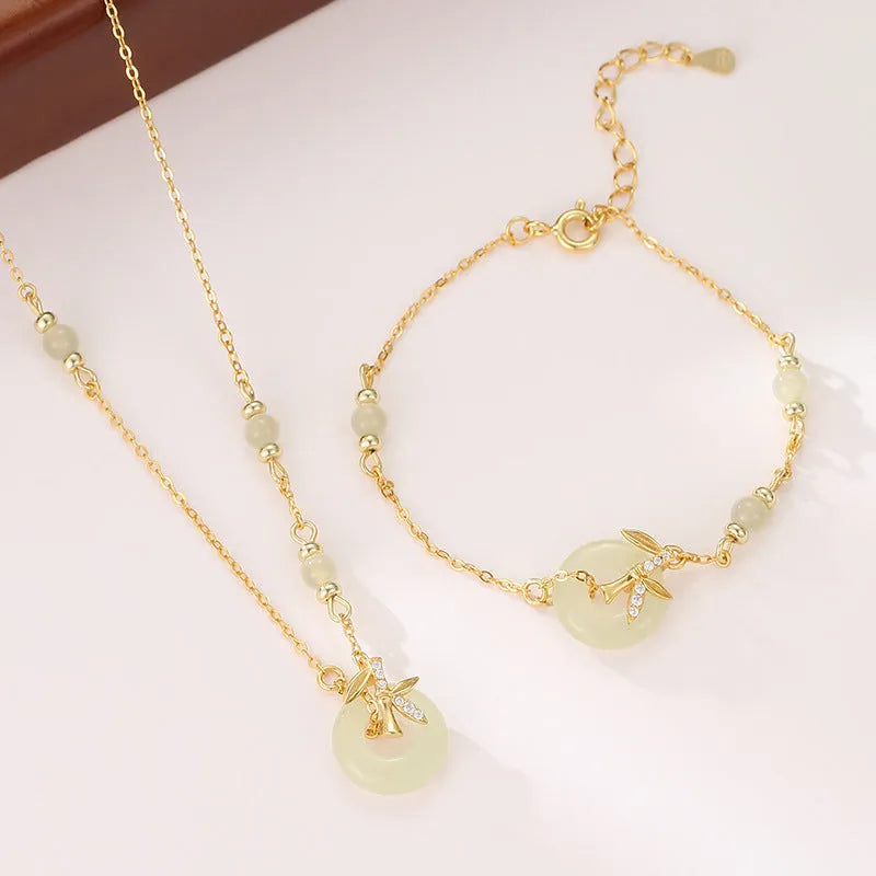 Women's Hetian Jade safety buckle bracelet in antique style with peace buckle design on 925 silver