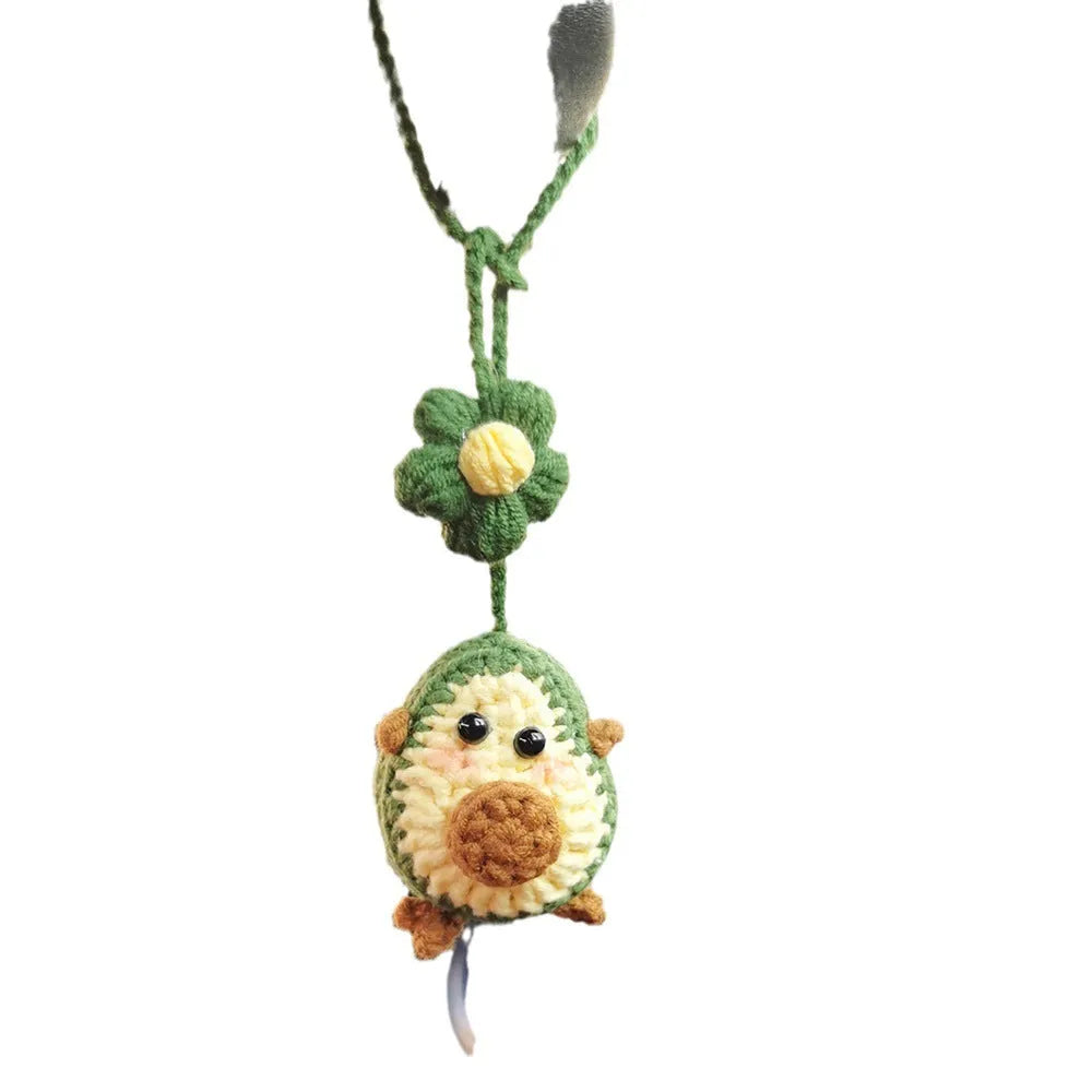 Handmade crocheted car pendant in avocado, pink rainbow, and red rainbow colour designs