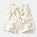 Men's khaki cargo shorts with straight leg cut and retro American street style design