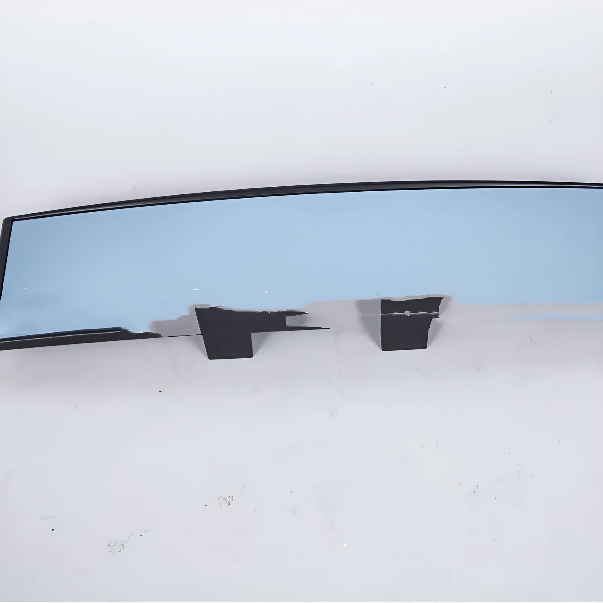 Curved blue filter rearview mirror measuring 270mm by 75mm with anti-glare coating
