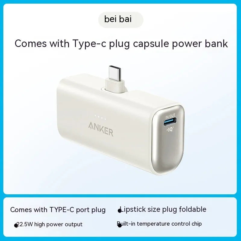 Small capsule-shaped power bank in multiple colours with a foldable USB-C cable.