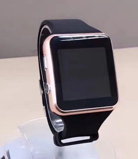 Black smart watch with 1.54 inch display on a silicone strap, showing a watch face and fitness data.