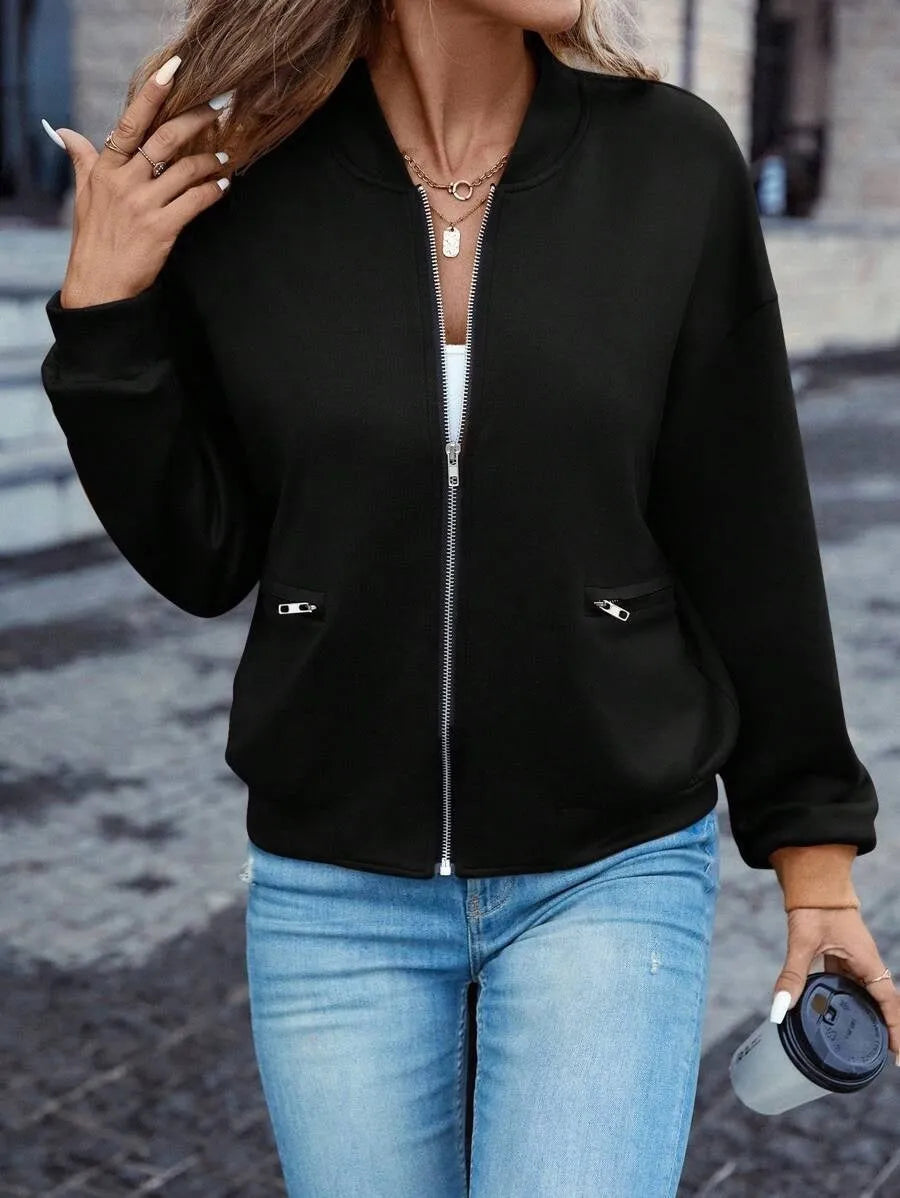 Black women's casual zip-front jacket with long sleeves and faux pockets.