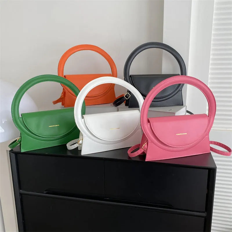 Horizontal square messenger bag in multiple colours with sandwich pocket design and stitching details