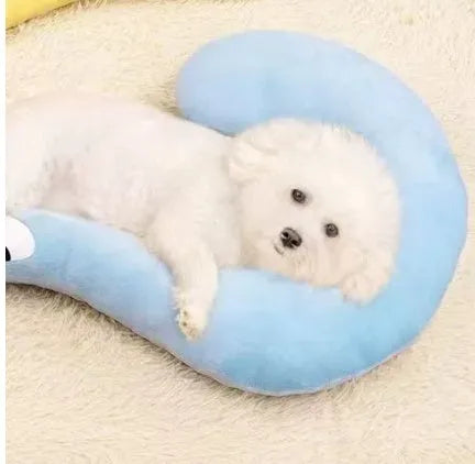 Blue U-shaped cloth pet sleeping mat for cats with neck support pillow in a question mark design.