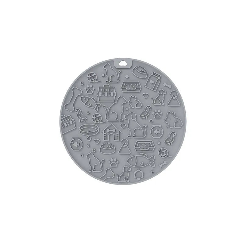 Round blue silicone pet lick mat with suction cup base on a white background.