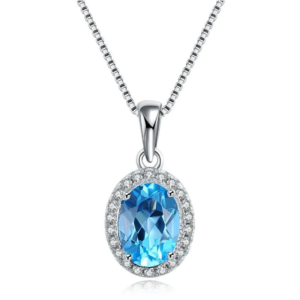 925 sterling silver blue topaz geometric jewellery set with earrings, ring, necklace, and pendant