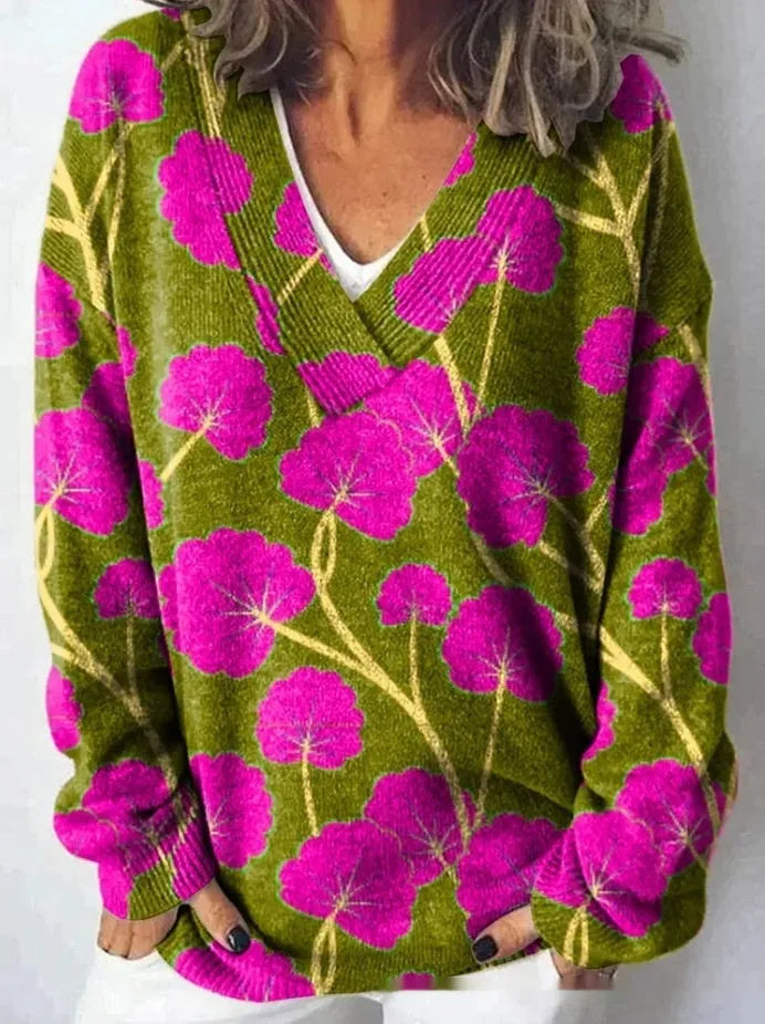 Women's V-neck long sleeve sweatshirt with a blue and white 3D floral print pattern.