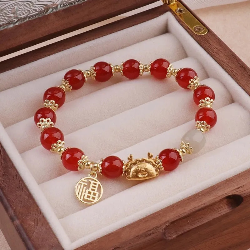 Floral glazed zodiac bracelet with glass beads and coloured glaze animal charm