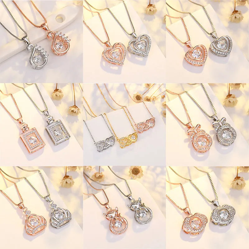 Sterling silver plated heart necklace pendant with crown and bow details in rose gold or silver colour