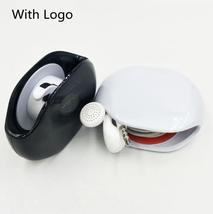 Automatic earphone retractor winder in black with extended cable showing push-type mechanism