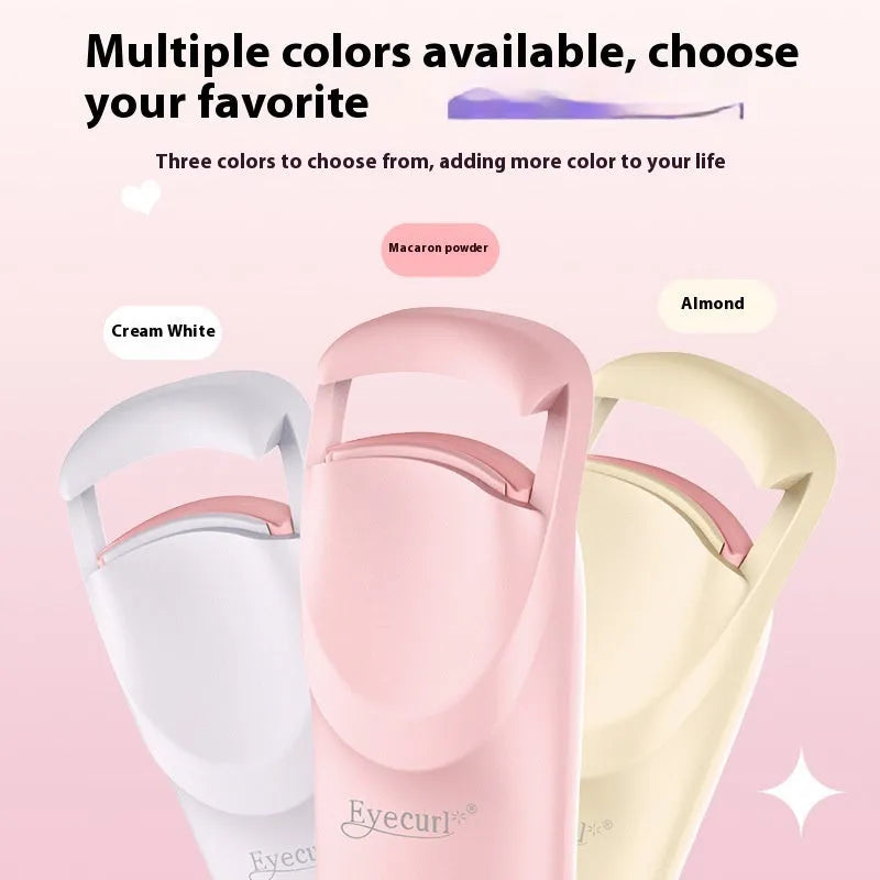 Electric heating eyelash curler in pink with USB charging cable on a white background
