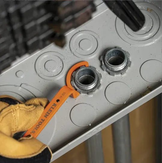 Three colour-coded crescent wrenches with magnetic suction bases: orange, grey and black adjustable spanners