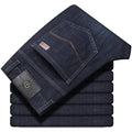 Women's straight-leg stretch jeans in black and blue colours showing business casual styling