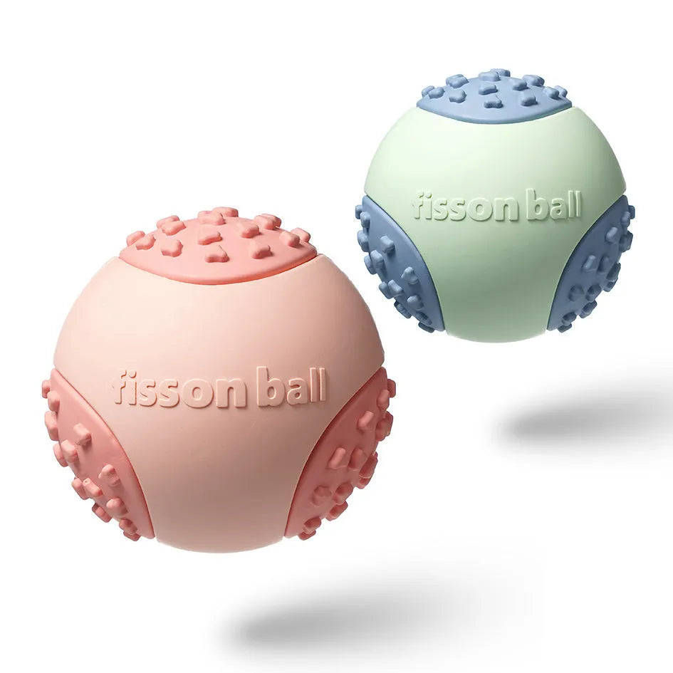 Green and pink interactive rolling ball dog toy 64mm diameter on a neutral background.