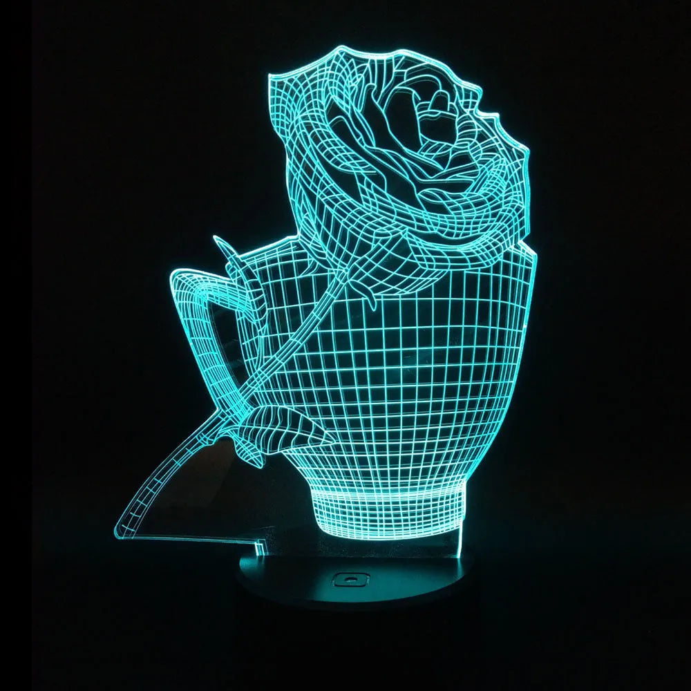 3D rose flower shaped night light glowing with multi-coloured LEDs on a black ABS base.