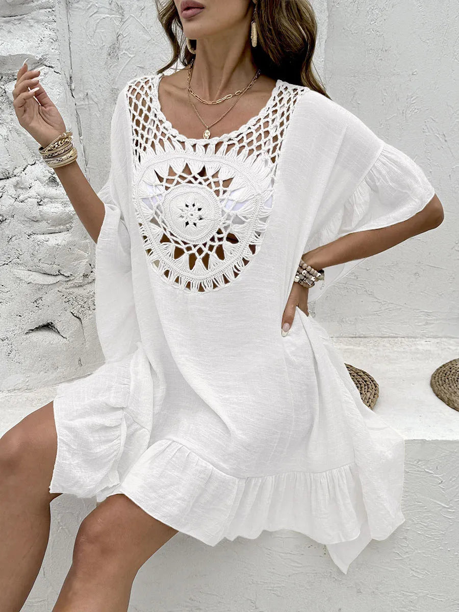 Crochet patchwork beach dress swimsuit cover-up in apricot colour with tassel details.