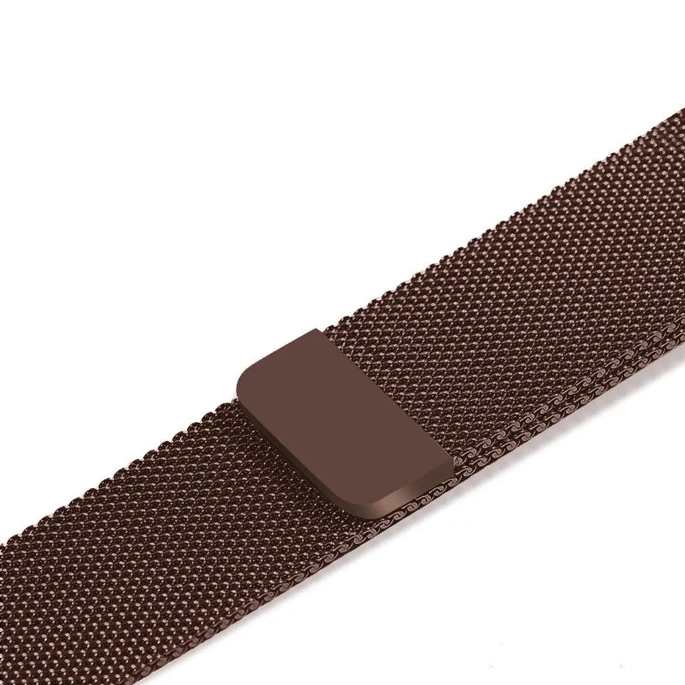 Stainless steel watch replacement strap in silver on a grey background showing adjustable links and buckle.