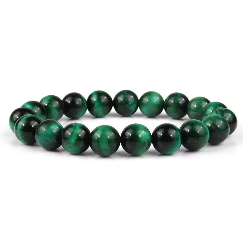 Natural tiger eye crystal beaded bracelet for men and women on a white background.