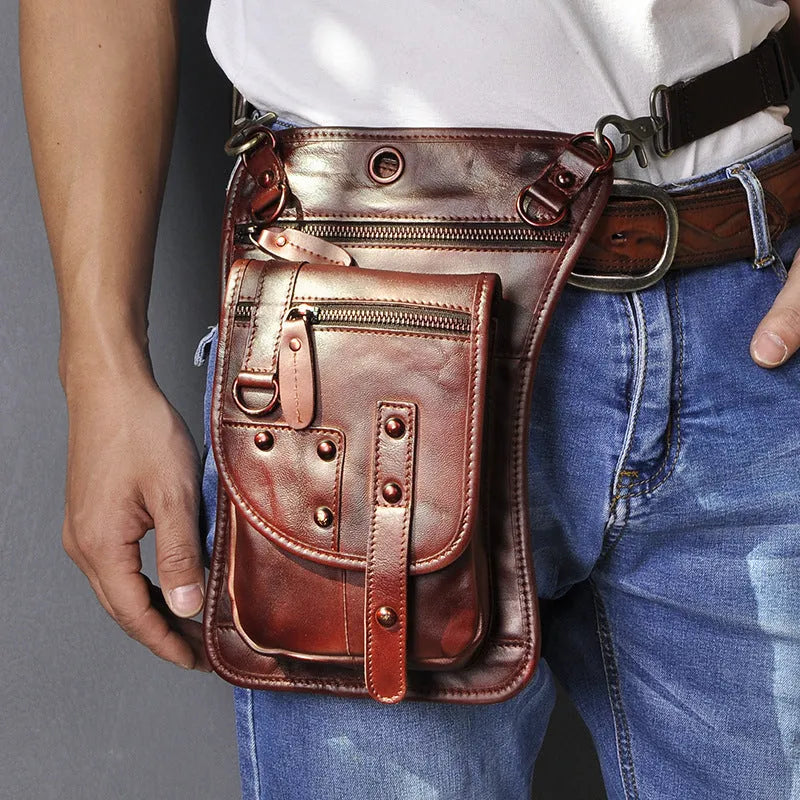 Men's black genuine cowhide leather punk-style fanny pack worn on the waist.