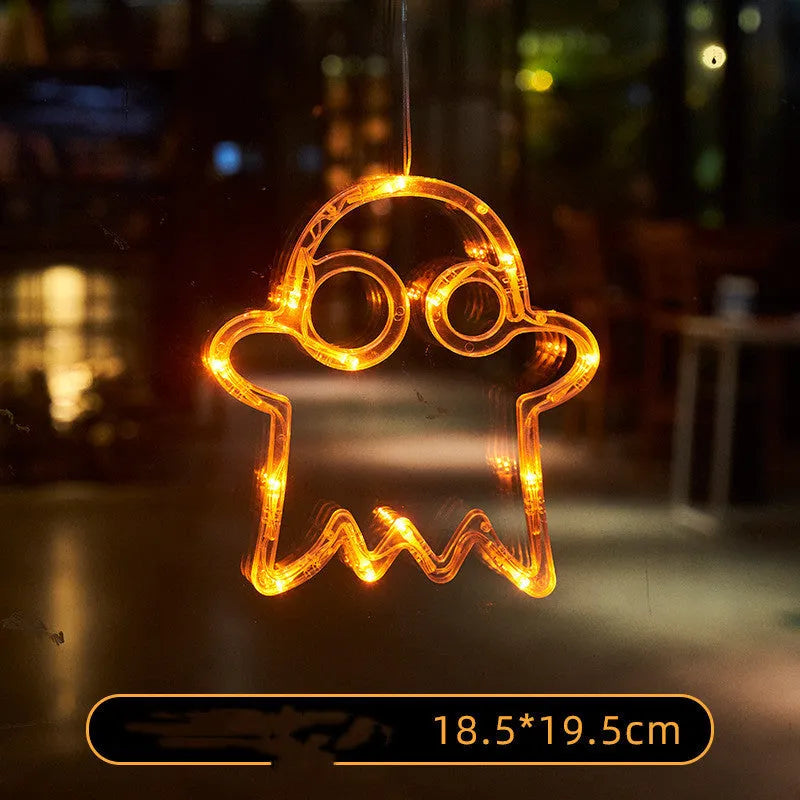 Halloween window hanging LED lights with seven designs including spider, pumpkin, ghost, and bat motifs