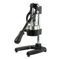 Black and white cast iron manual citrus juicer with stainless steel strainer, 40cm tall.