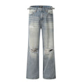 Blue men's straight-leg jeans with ripped detailing on the legs, showing a zipper fly.