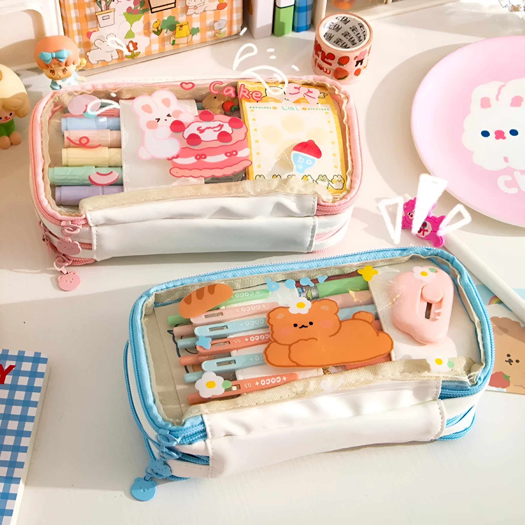 Transparent TPU pencil case with pink cake rabbit and red love rabbit designs for school stationery storage