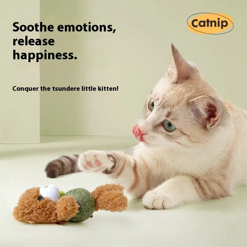 Brown bear plush cat toy with a bell, next to a mint ball, showing its 15cm height.