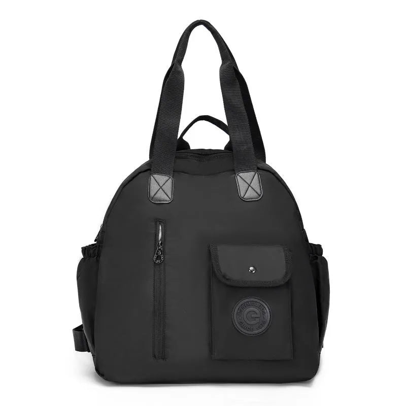 Women's lightweight nylon backpack in black, khaki, or green letter rabbit colours showing sandwich pocket design