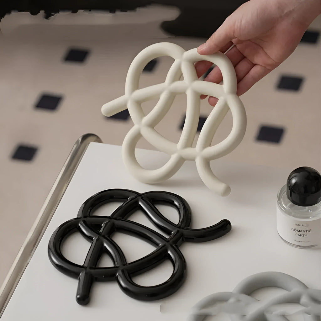 Ceramic heat proof mat in modern minimalist design with irregular shape