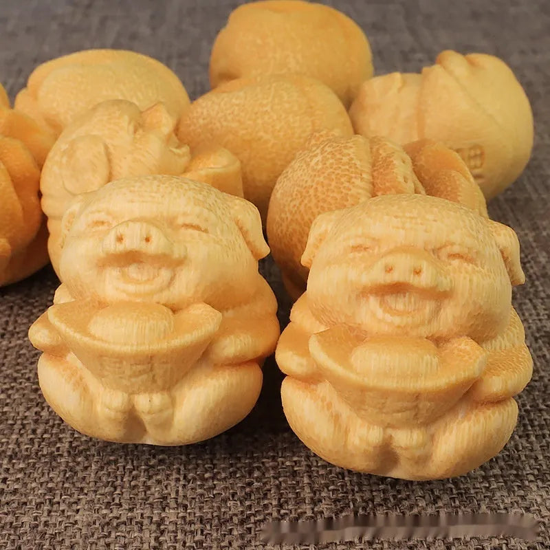 Fulu pig bamboo carving ornament measuring 4cm height with 3.5cm diameter in solid bamboo material